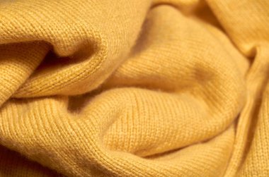 Makro fotoğraf kumaş desen, tekstil giyim alan sığ derinliği ile kapatın. Yumuşak malzeme arka plan bulanık