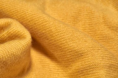 Makro fotoğraf kumaş desen, tekstil giyim alan sığ derinliği ile kapatın. Yumuşak malzeme arka plan bulanık