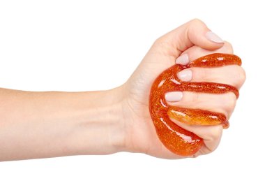 el, şeffaf oyuncak ile turuncu sümük oynayan çocuk