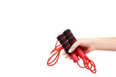 Kırmızı fitness ve spor yaşam için el ile ip atlama.