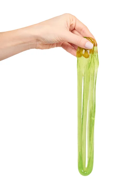 Adolescente jogando lodo verde com a mão, brinquedo transparente — Fotografia de Stock