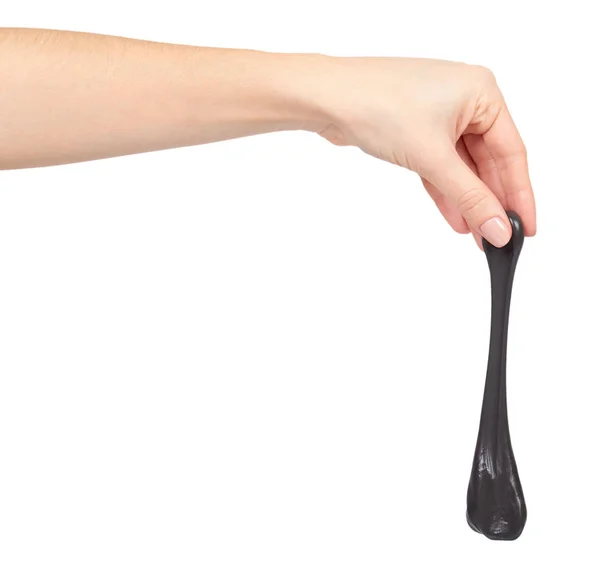Adolescente jugando limo negro con la mano, juguete transparente —  Fotos de Stock