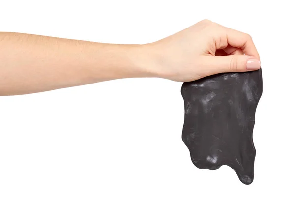 Adolescente jogando lodo preto com a mão, brinquedo transparente — Fotografia de Stock