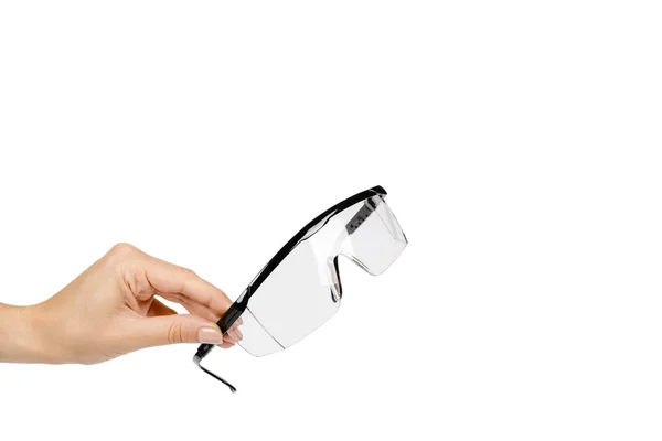 Ochranné pracovní oděvy na ochranu lidské oči, bezpečnostní brýle s rukou — Stock fotografie