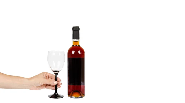 Closed bottle of wine with hand, alcohol and addiction concept — Stock Photo, Image