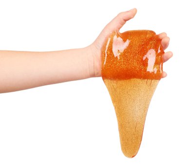 el, şeffaf oyuncak ile turuncu sümük oynayan çocuk