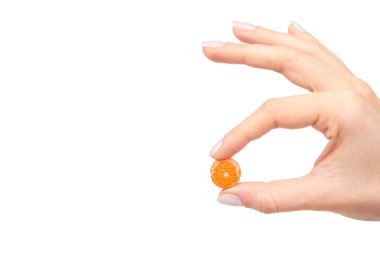 Renkli yuvarlak şekerle el, lolipop şeker
