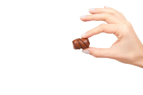 Mão com chocolate doce, sobremesa doce closeup — Fotografia de Stock