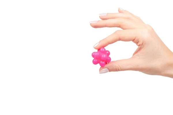 Mão com bola rosa spiky para massagem, conceito de saúde — Fotografia de Stock