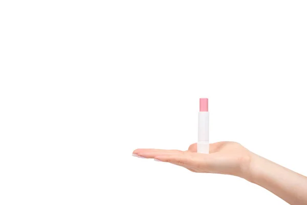 Hand mit rosa Balsam Lippenstift, Lippenpflege und Schönheit — Stockfoto
