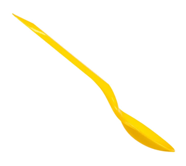 Żółta plastikowa łyżka, jednorazowe przybory. Odizolowane na biało — Zdjęcie stockowe