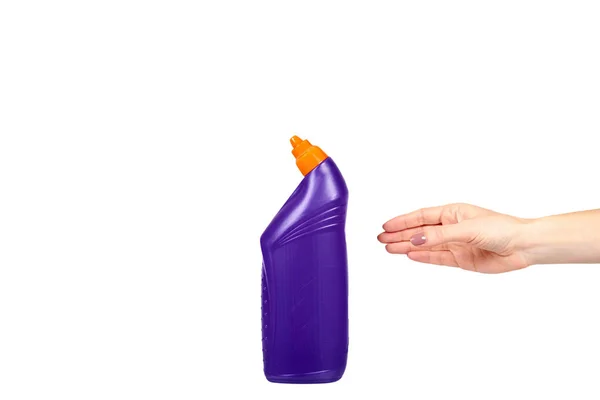 Hand med lila toalett gel, hushålls hygien, plastflaska. — Stockfoto