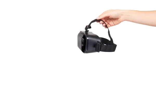 Mano con auricolare VR in plastica nera, maschera di realtà virtuale . — Foto Stock