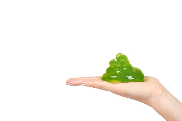 Adolescente jogando lodo verde com a mão, brinquedo transparente — Fotografia de Stock