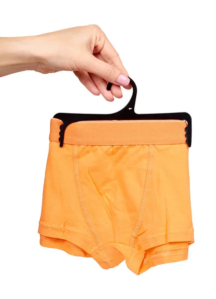 Hand with bright boxer underwear, cotton pants. — Stock Photo, Image