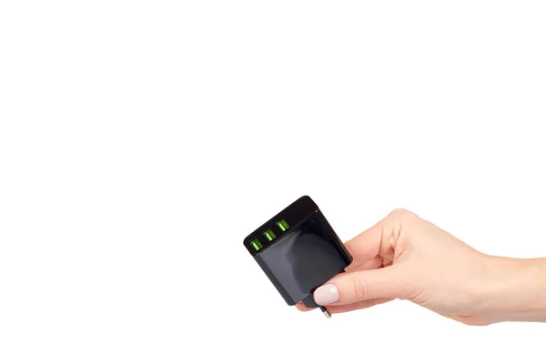 Hand mit schwarzem USB-Stecker, drei Ports. — Stockfoto