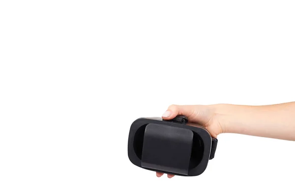 Mão com fone de ouvido VR de plástico preto, máscara de realidade virtual . — Fotografia de Stock