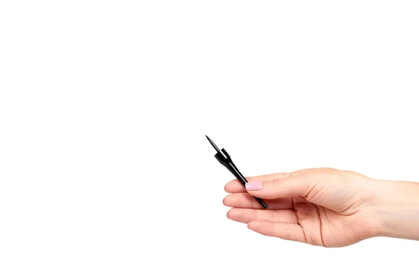 Hand with black liquid pencil, eye makeup brush. — Stock Photo, Image