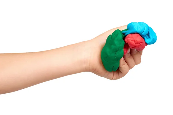 Children hand with color plasticine, kids educational toy. — Stock Photo, Image