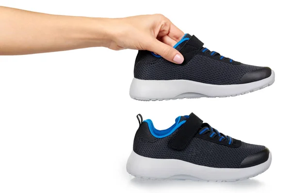 Scarpe sportive scure per correre. Bambini usura del piede . — Foto Stock