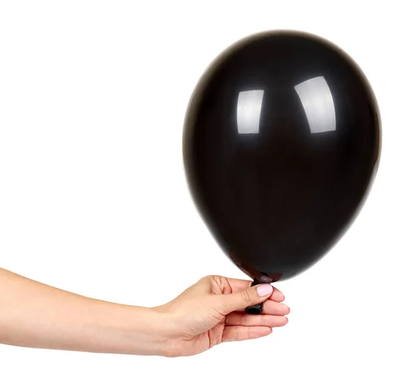 Mão com balão inflável preto, decoração do evento do partido, bola brilhante . — Fotografia de Stock