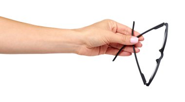 Siyah gözlüklü el, göz optik düzeltme aracı.