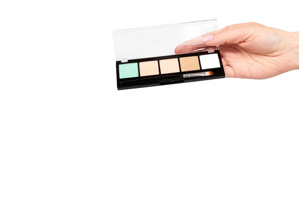 Hand mit Farbpalette, Augen Make-up Pinsel. — Stockfoto