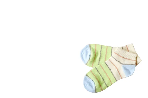 Смугастий бавовняний шкарпетка, дитяче взуття. Ізольований фон — стокове фото