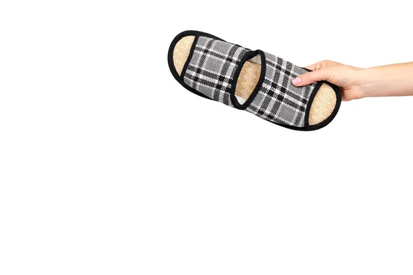 Çizgili pamuklu terlik, çocuk ayakkabıile el. — Stok fotoğraf