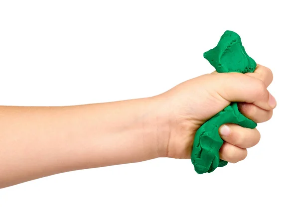 Mão das crianças com plasticina da cor, brinquedo educativo das crianças . — Fotografia de Stock