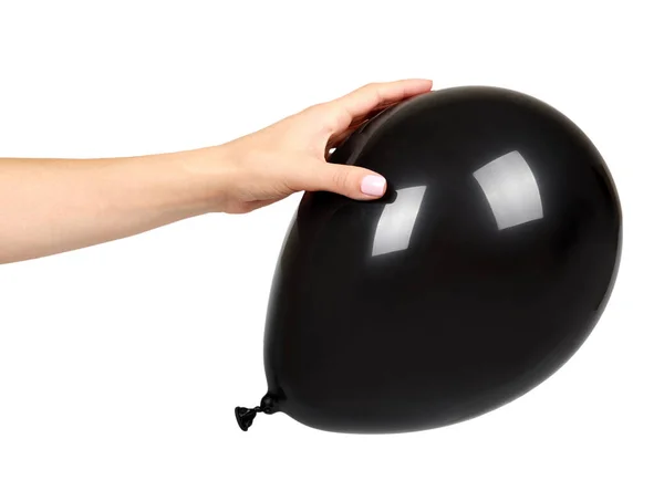 Mão com balão inflável preto, decoração do evento do partido, bola brilhante . — Fotografia de Stock