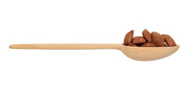 Çikolatalı yastık gevreği, kahvaltı yemeği. Yulaf ve mısırlı gevrek. Tahta kaşık..