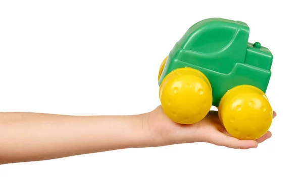 Plastic green toy car with big yellow wheels. — Stock Photo, Image