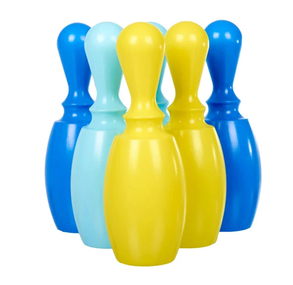 Plastic colored skittles for bowling game. Kids toy. — Stock Photo, Image