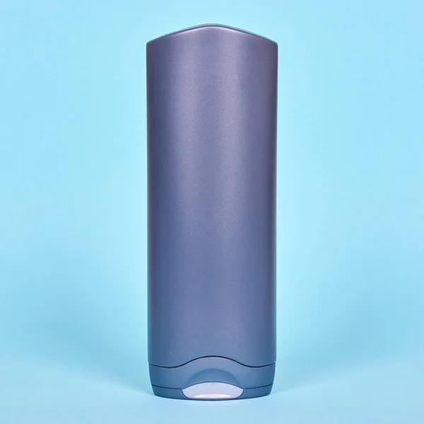 Gray Shampoo Bottle Blue Background — Stock Photo, Image