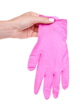 Pembe tıbbi koruma eldivenli el..