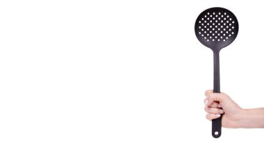 Siyah plastik kepçe, mutfak aletleri..