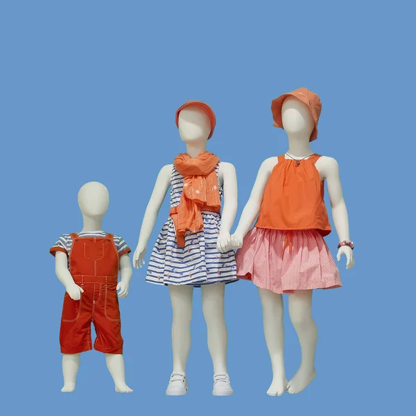 Three Mannequins Dressed Casual Kids Wear Isolated Blue Background Brand — Stock Photo, Image
