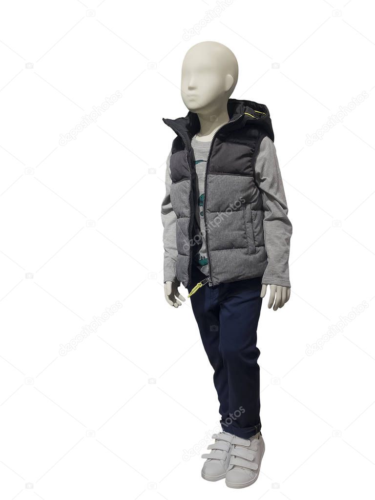 Full-length child mannequin dressed in fashionable kids wear, isolated on white background. No brand names or copyright objects.
