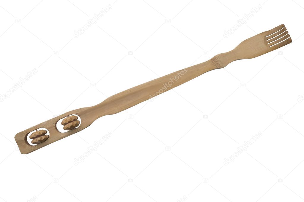 Wooden backscratcher with massager, isolated on white background.