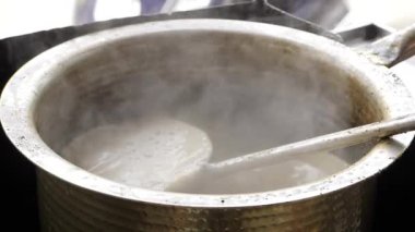 A Whiff of Indian Elegance - The Art of Tea Stirring