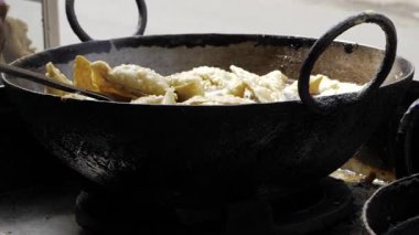 Indian Street Food Sizzling in a Skillet - A Delightful Culinary Experience