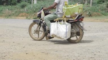 Motorcycle Riding on Paved Road - A Journey Through the Dirt and Asphalt
