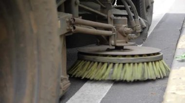 Cleaning the Streets - A Close-up Look at a Road Sweeper's Brush