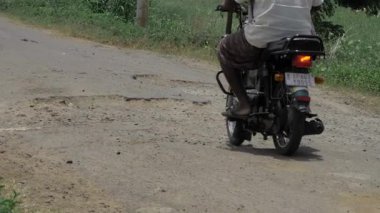 Riding on the Indian Roads - A Journey Through the Potholes and Patches