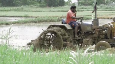 Farmers in the Field - A Modern Look at Tractor Tending