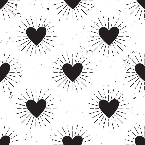 Vector grunge seamless pattern with heart and sunburst — Stock Vector
