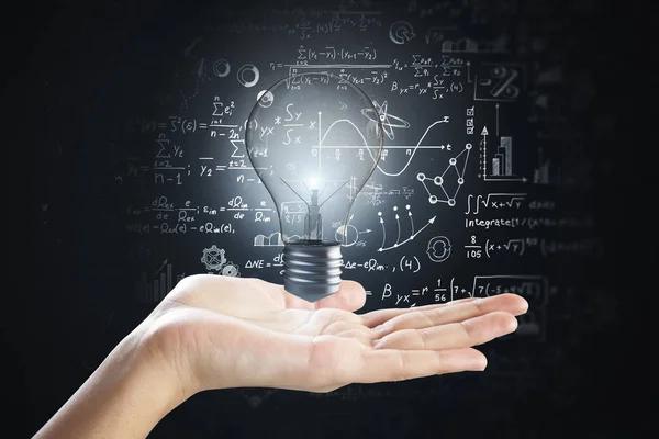 Hand Met Verlichte Lamp Met Wiskundige Formules Concept Idee Wetenschap — Stockfoto