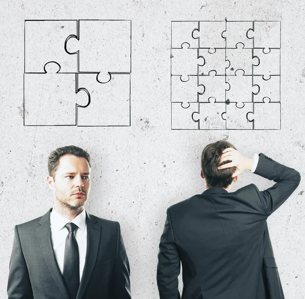 Discrimination Concept Two Businessmen Puzzle Parts Light Wall — Stock Photo, Image