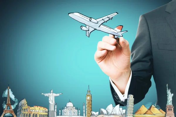 Business Travel Concept Businessman Holding Drawn Aircraft Famous City Sights — Stock Photo, Image